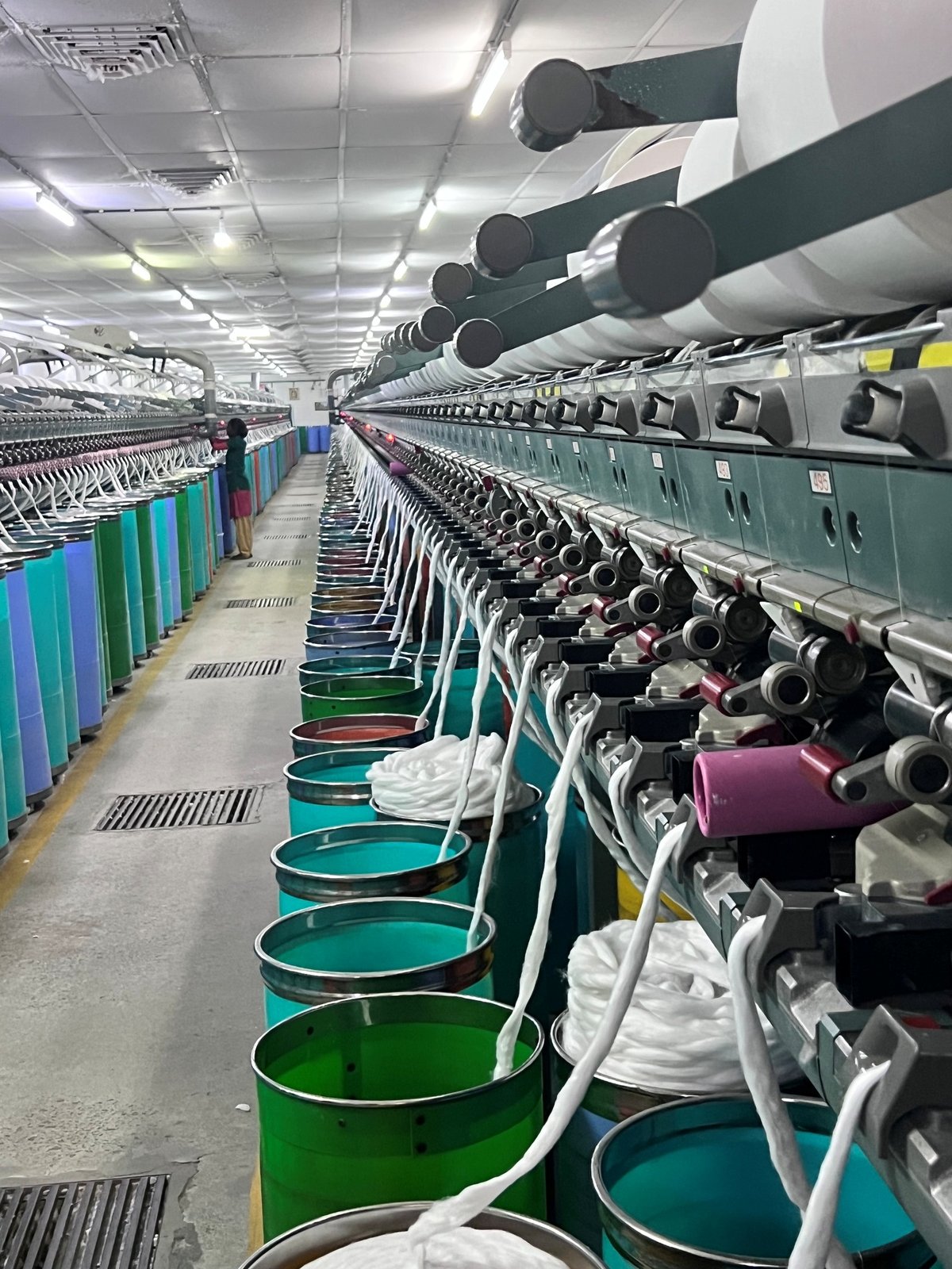 Ring spinning line turning fibre into new yarn